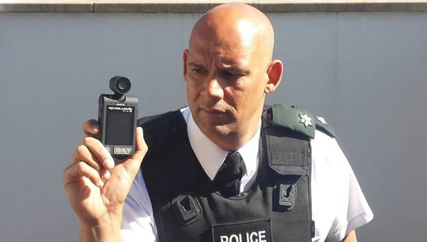 Policeman showing a body camera